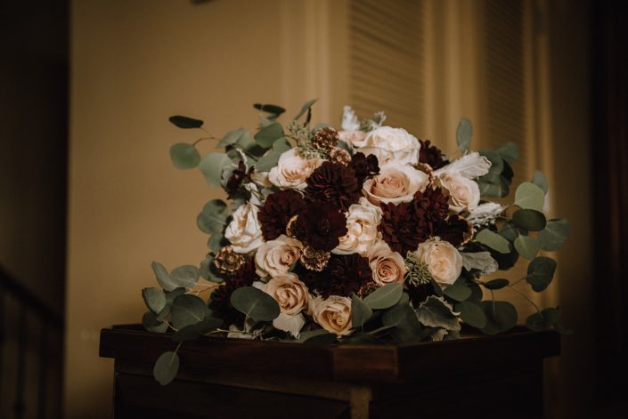 Bridal bouquet desinged with choclate cosmos, burgundy dahlia, white ohara garden roses, quicksand roses and silver dollar eucalypus