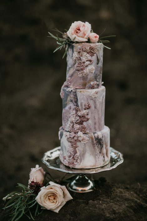 bas relief fondant cake in blush and mauve with quicksand roses and eucalyptus greenery to accent
