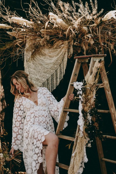 blonde boho bride styled shoot with foraged backdrop if twig and pampas grass