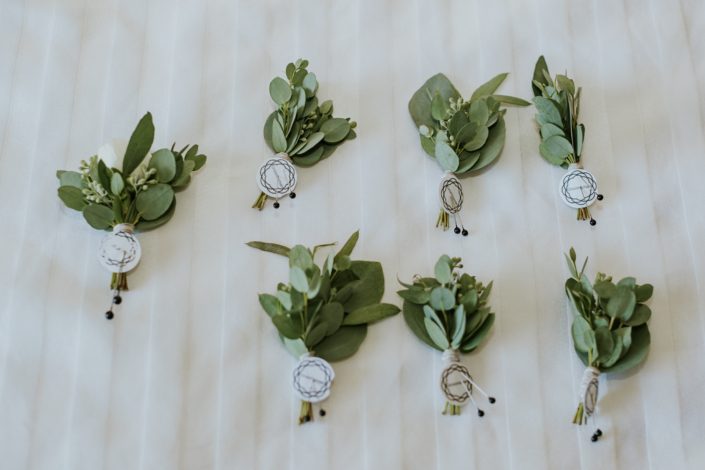 Eucalyptus boutonnieres for Brooke and Levi's Rustic Chic Blush Wedding
