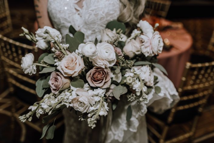 Cambridge Bridal Show 2020 - Bridal bouquet of blush and ivory roses with greenery and trailing ribbons.