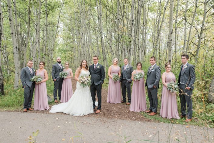 Amber and Mike's Elegant Mauve and Ivory Bridal Party with mauve and ivory bridal bouquet, entirely greenery bridesmaids bouquets and boutonnieres.