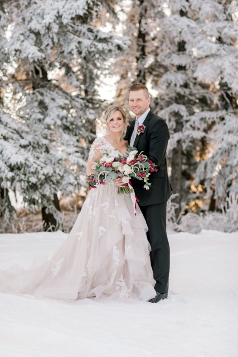 Blush and Burgundy Winter Photoshoot - bride and groom with bouquet and boutonniere