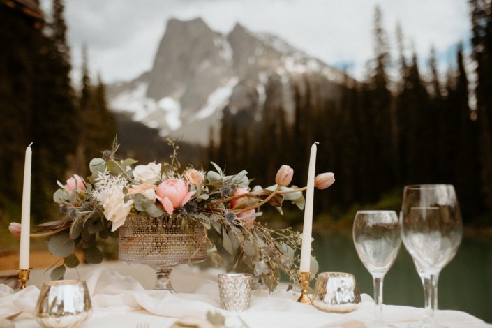 Emerald Lake Photoshoot 2020 - sweetheart table centrepiece designed with pink peonies, Playa Blanca roses, blue eryngium, toffee roses, tulips, bleached Italian ruscus and eucalyptus greenery