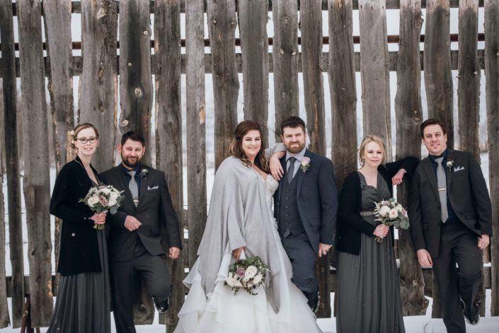 Mauve and Navy Winter Wedding bridal party with mauve and ivory flowers