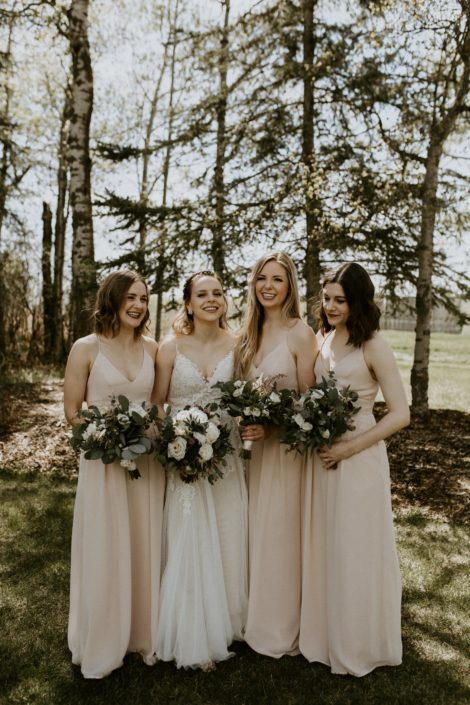 Blush, white and burgundy Bride and bridesmaids at Pine and Pond with bouquets