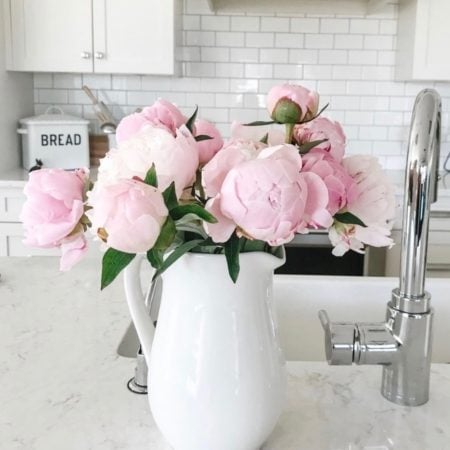 Peony hand tied bouquet in white vase