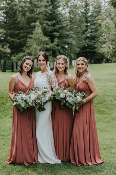 Rusty Rose Wedding at Hilltop; bride and bridesmaids with bouquets