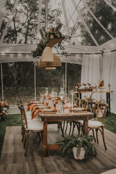 Small, intimate tent wedding with natural elements
