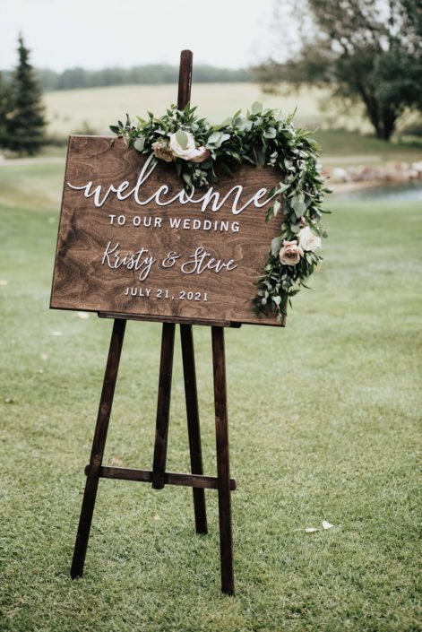 WEdding Ceremony sign with floral garland