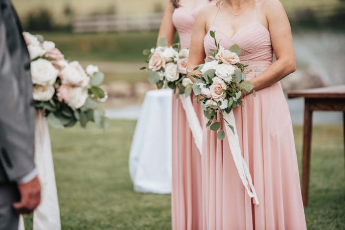 blush bridesmaids with bouquets
