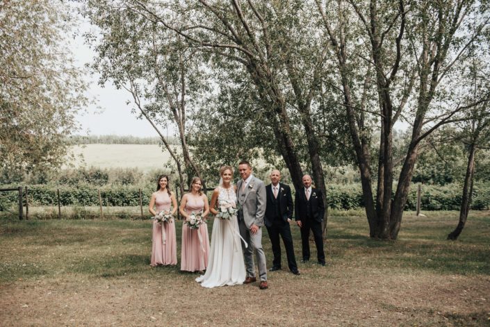 WEdding party with blush in the outdoors