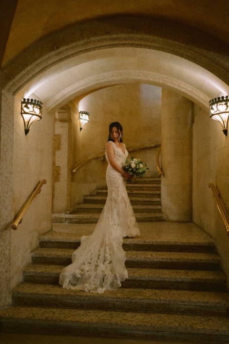 Bride on castle stairway