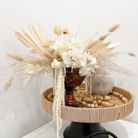 bleached dried floral arrangement in copper compote