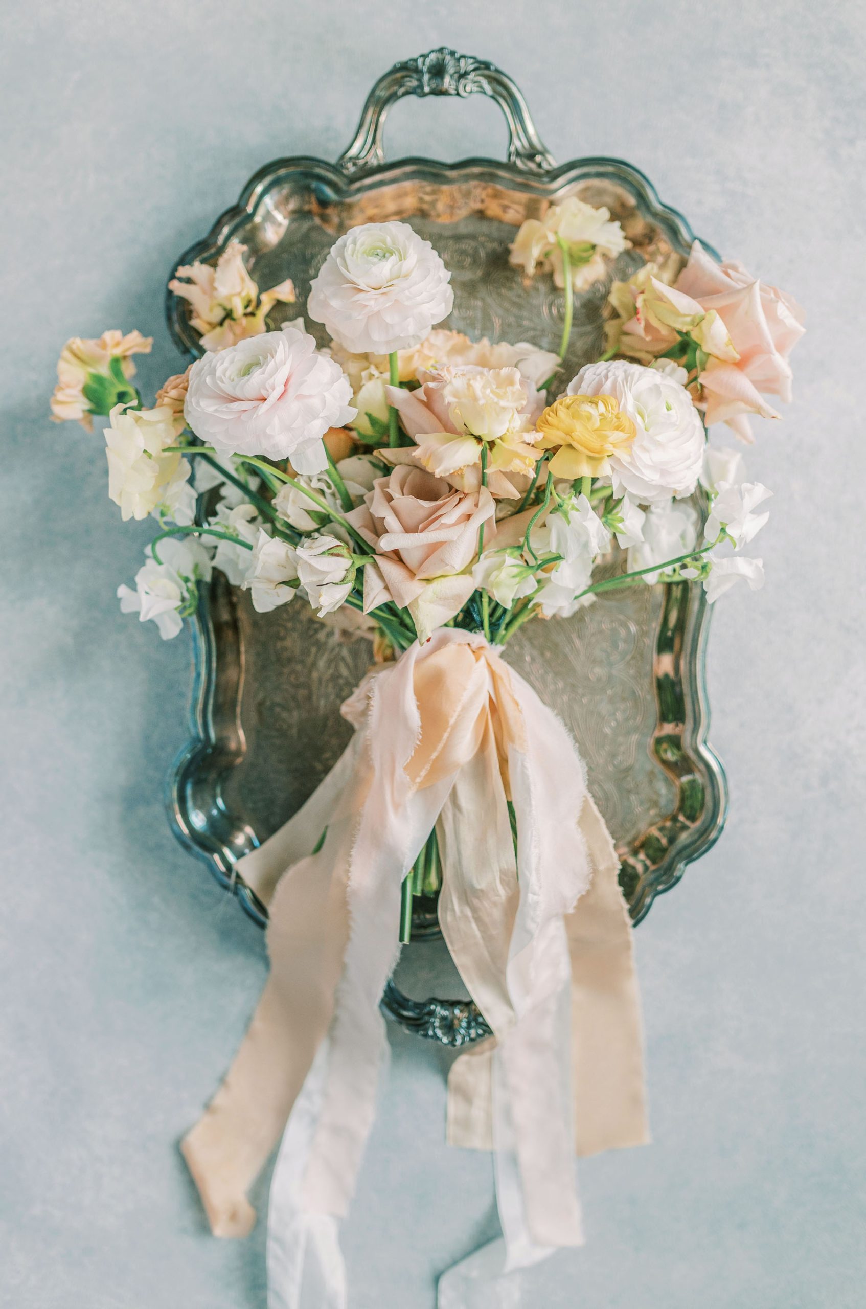 Delicate blush white and yellow bouquet