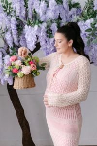 Bella's basket is a woven basket filled with a bright mix of spring flowers