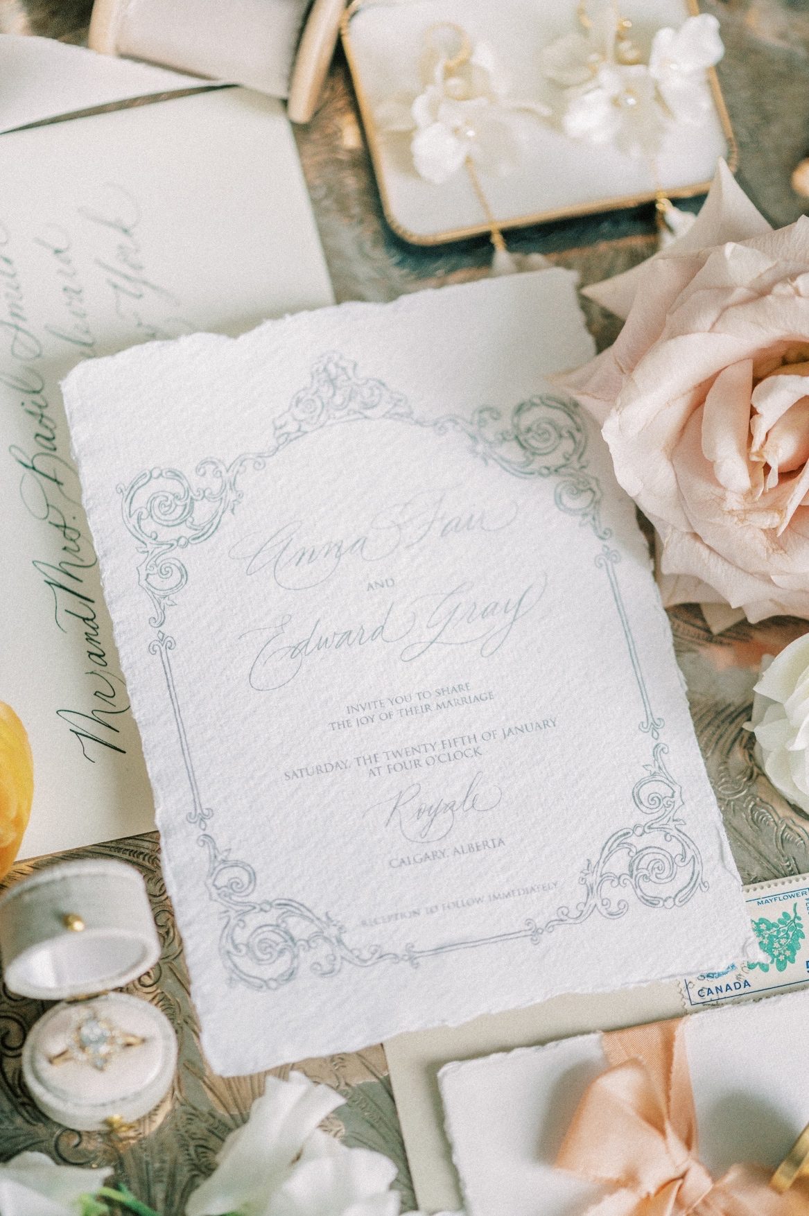 A close up of the beautiful wedding invitation
