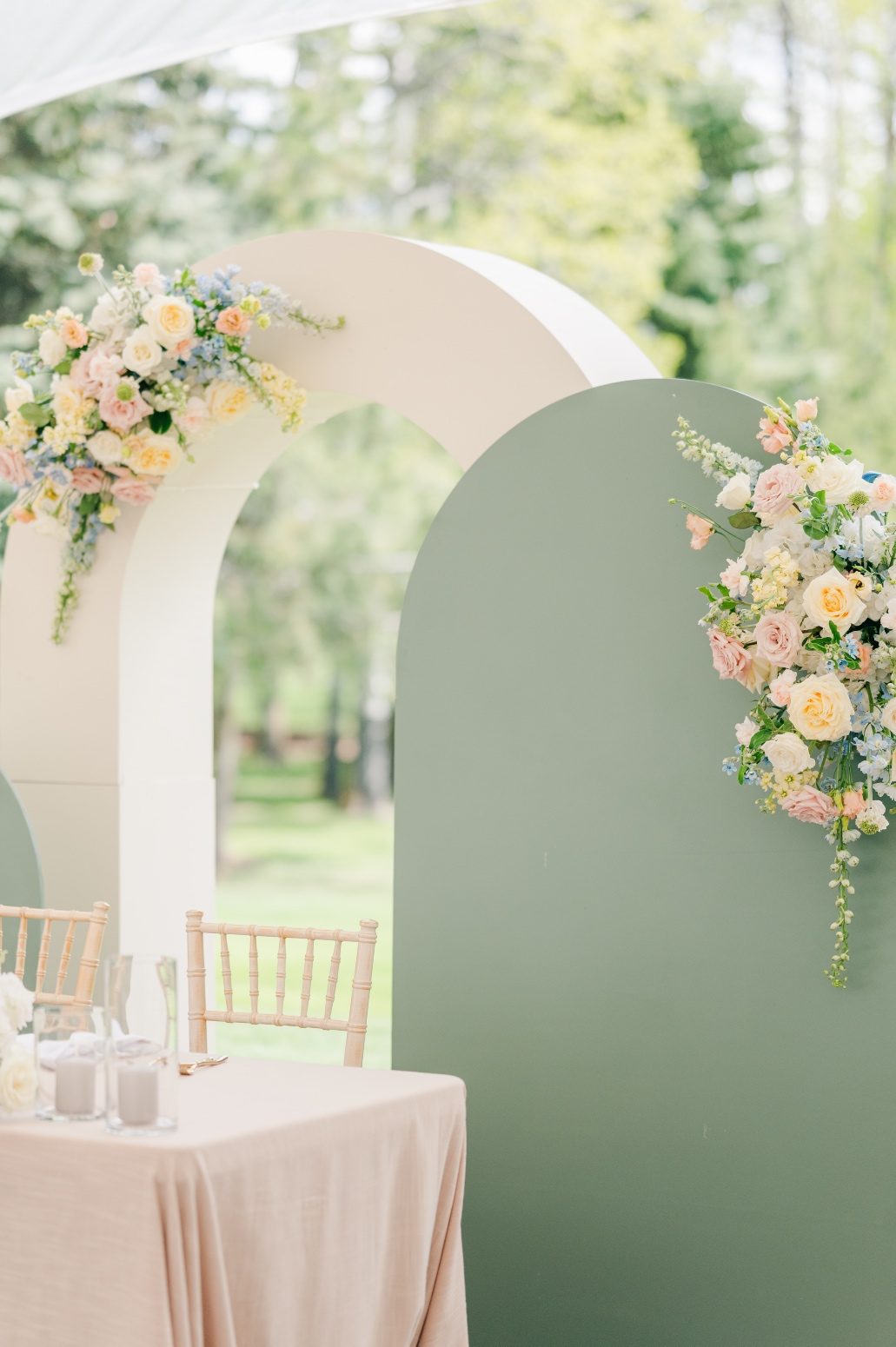 Detail shots of the floral arrangements on the modular backdrop.