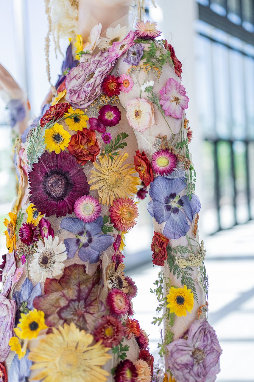 A detail shot of Taylor Swifts dried flower bodice