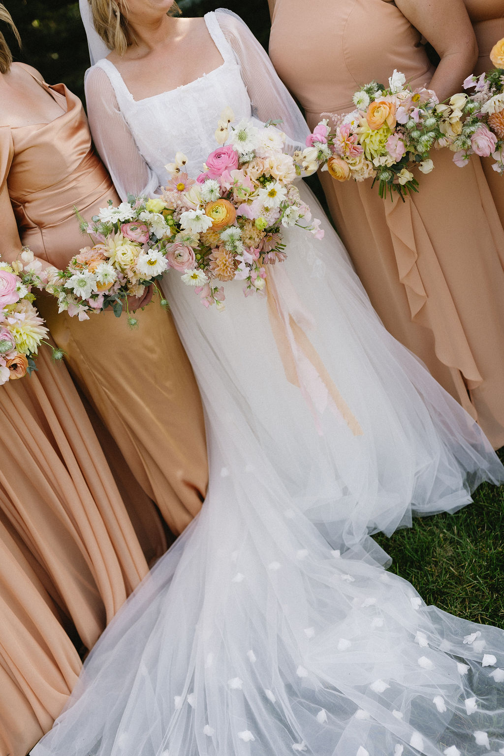 Close up of the beautiful gardeny bouquets in pink, peach and white.