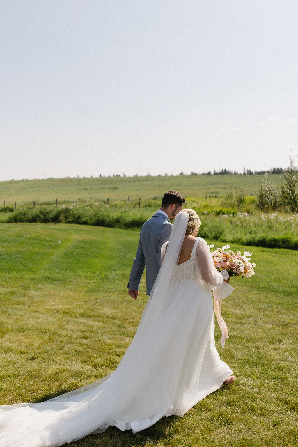 A quiet little moment between McKinley and Eric at the scenic grounds of the Tin Roof Event Centre.