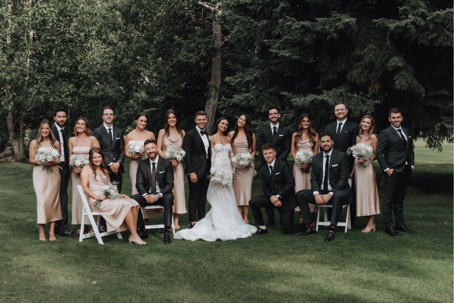 Wedding Party Tianna, Mitchell and their large wedding party posing for the camera.