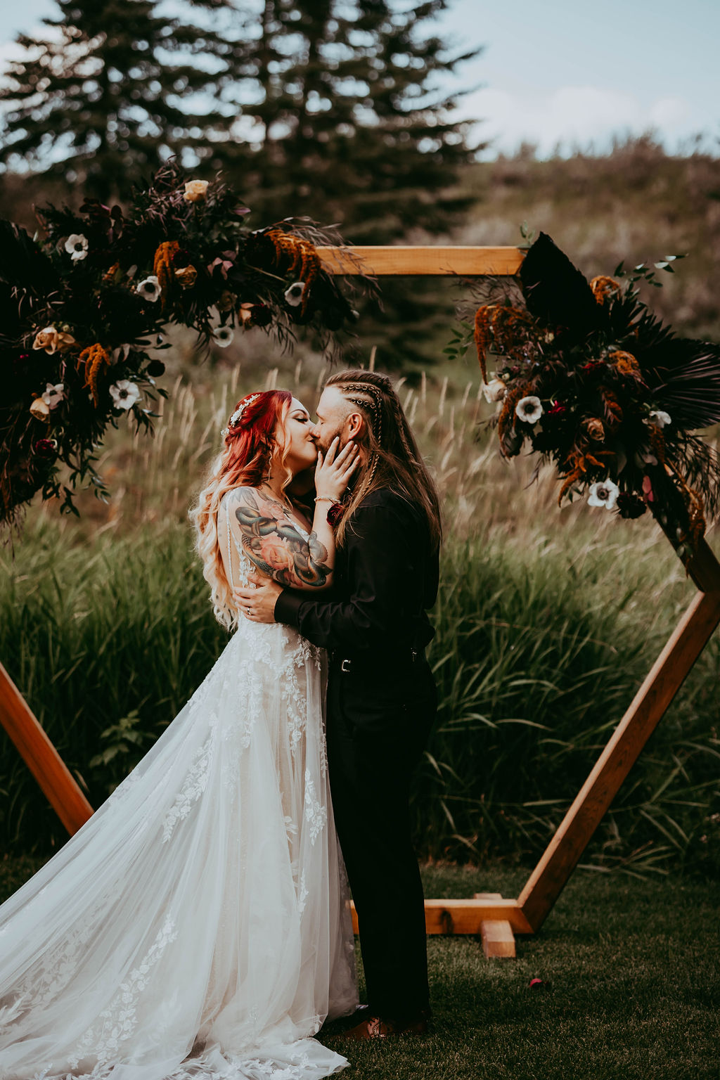 Haley and Greg seal it with a kiss after saying their "I do"s.