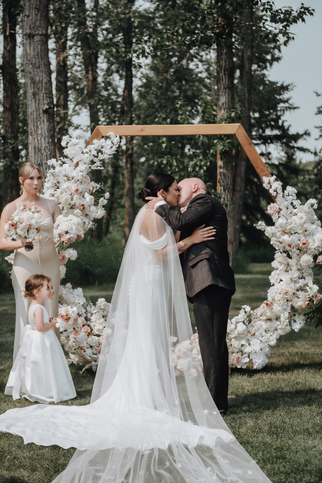 Kristin and Chris have said their 'I do's' and seal it with a kiss.
