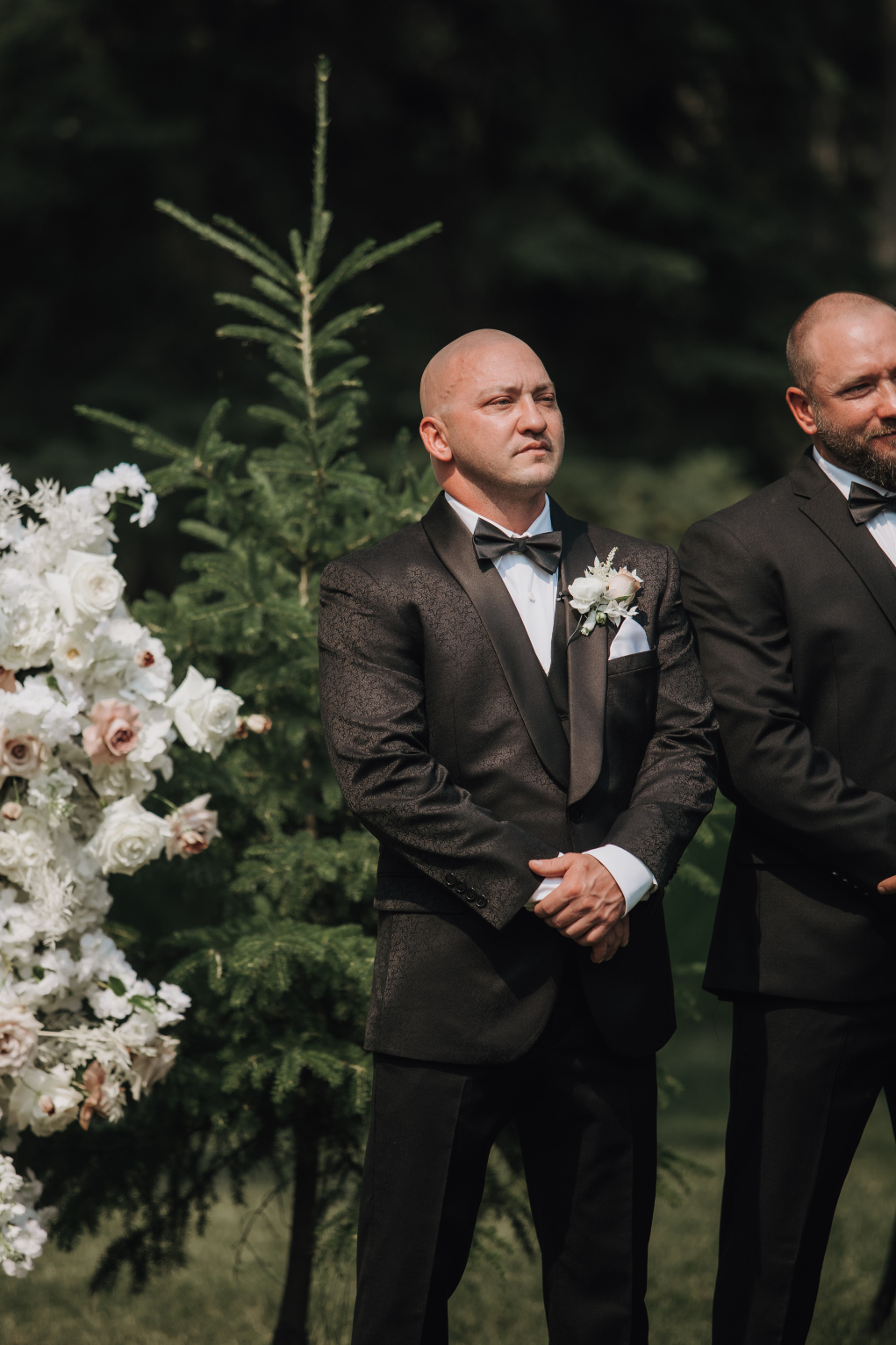 Chris waiting at the alter for his beautiful bride, Kristin