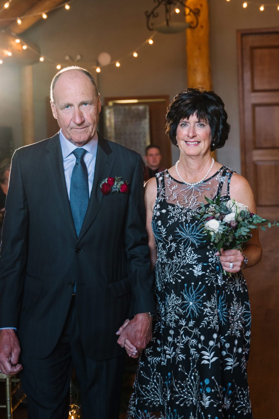 Calgary Wedding and Portrait Photographer The parents of our groom, with Mom carrying a mini bouquet.