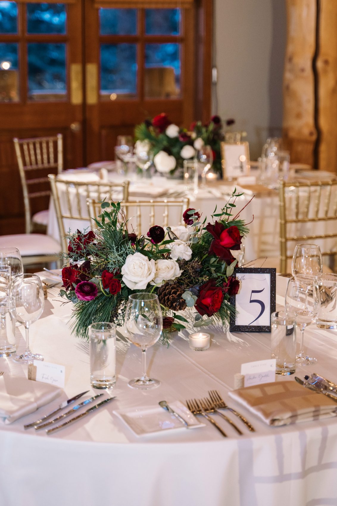 Guest Table Stunning guest centrepiece in burgundy and white.