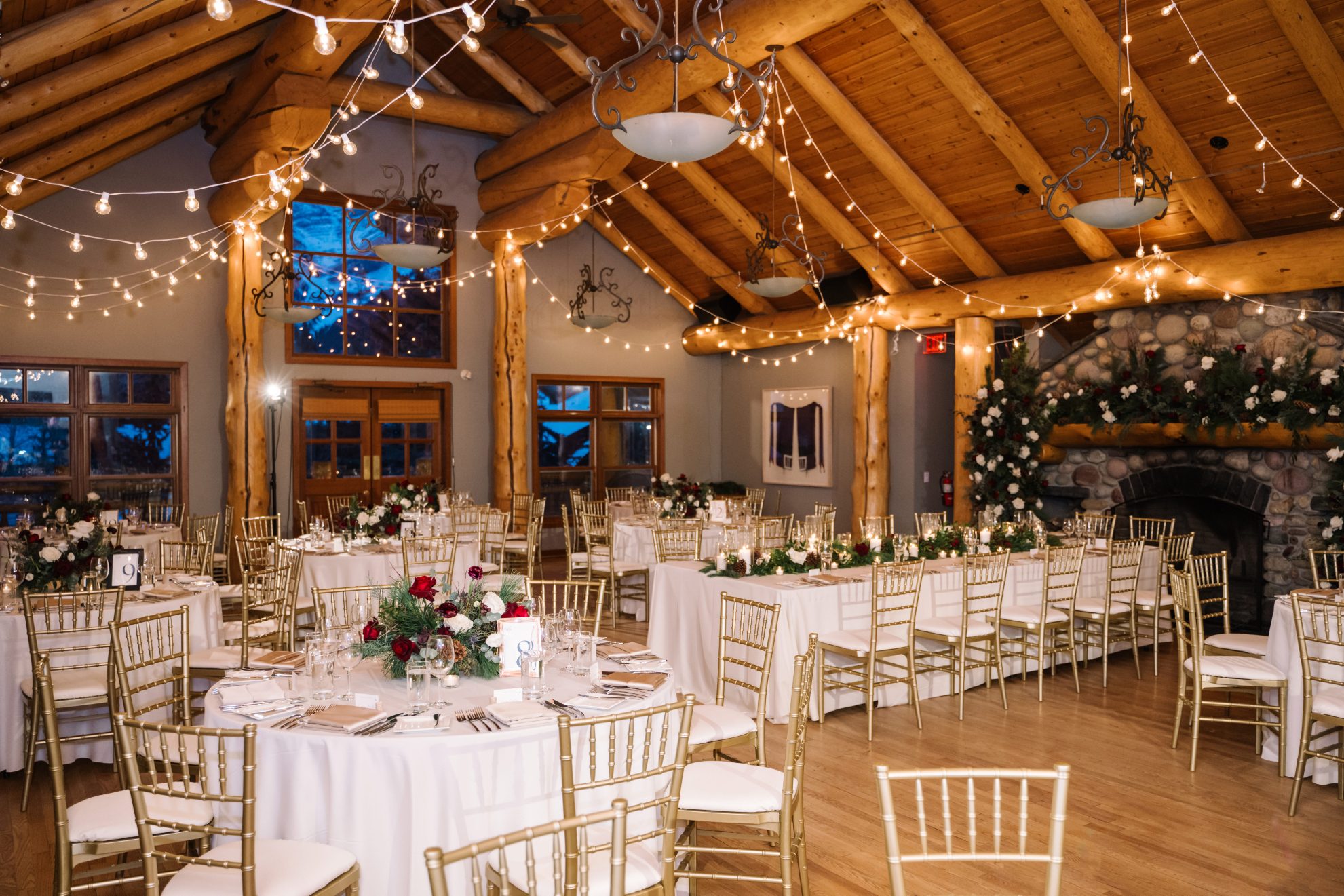 Reception Space The reception set up looked beautiful with twinkling lights, glowing candles and tons of lavish centrepieces in romantic reds and ivory.