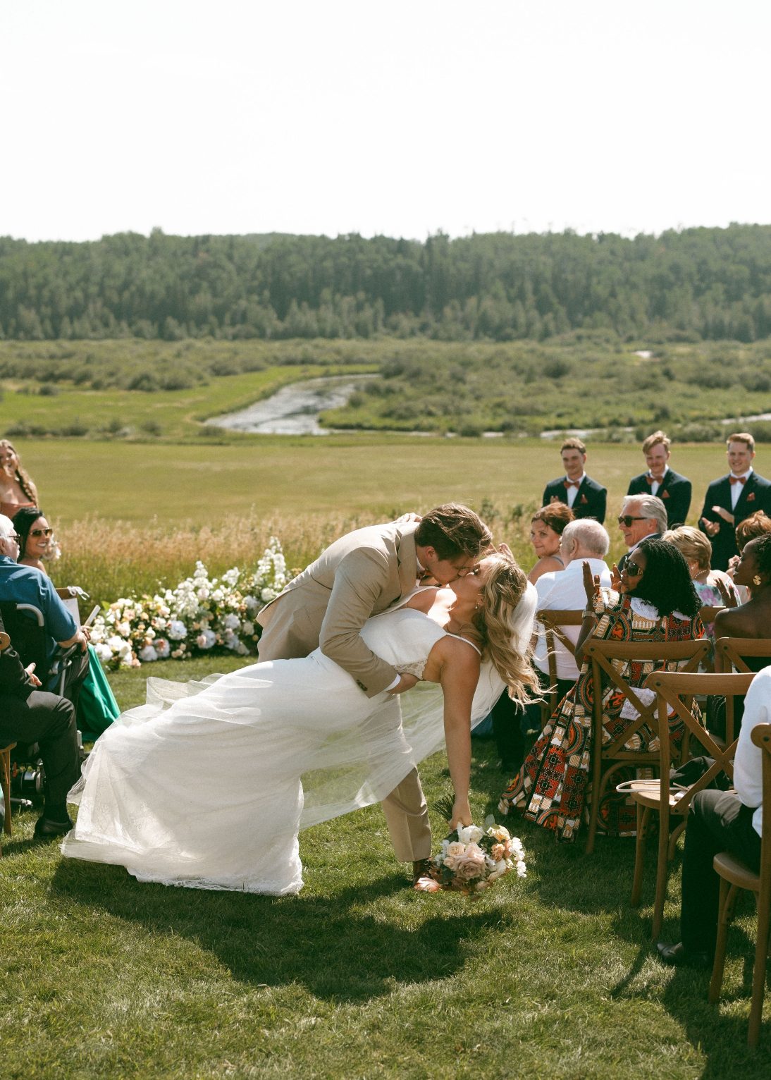 Connor dips Katrina half way down the aisle for a dramatic kiss.