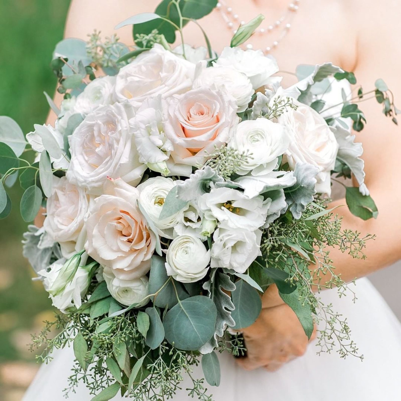 Bella Sprout Classic Blush Bouquet Classic Blush bridal bouquet of roses, ranunculus, lisianthus and eucalyptus.
