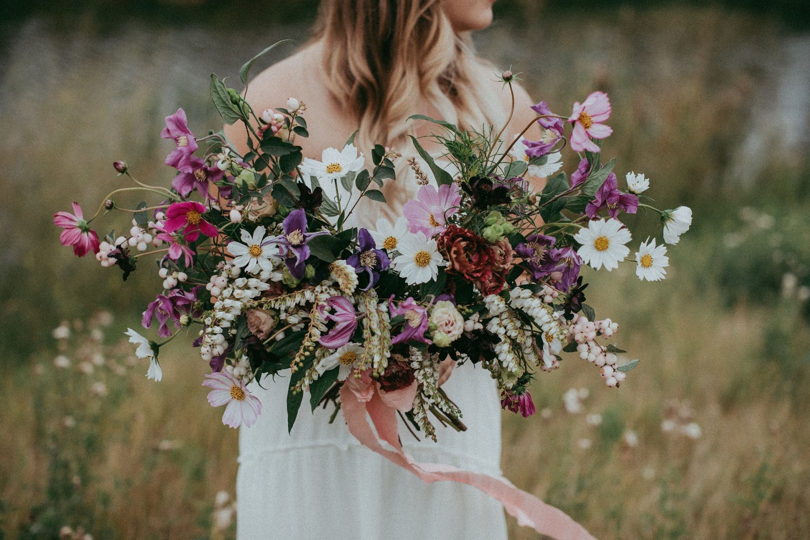 Bella Sprout Wildflower Our "Free Spirit Wildflower" Bouquet designed using mainly locally sourced freshly harvested flowers designed in a loose and natural style with trailing ribbons.