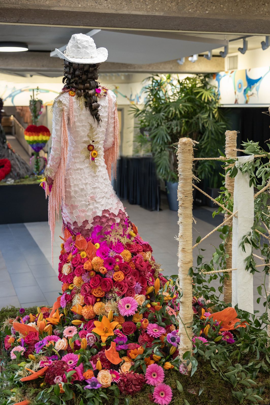 The back side of our cowgirl, showing the stunning floral display and some of the cool floral accents, like her hair.