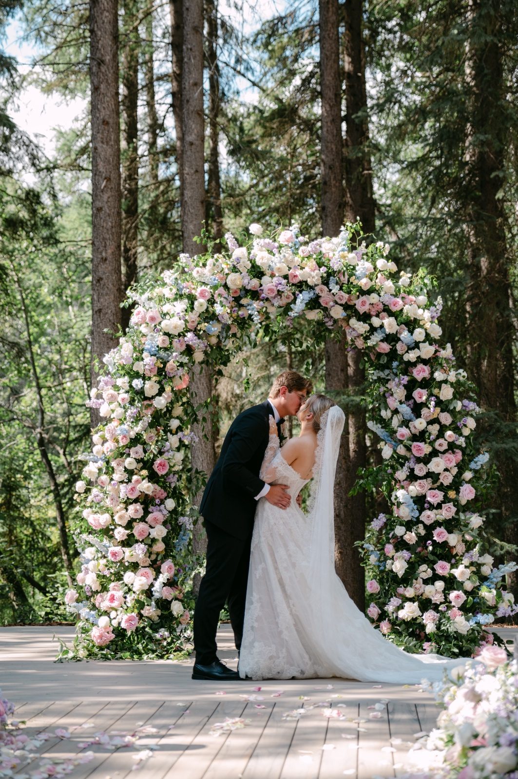 I Do Kaylee and Oran share a kiss in front of the floral arch, making it official!