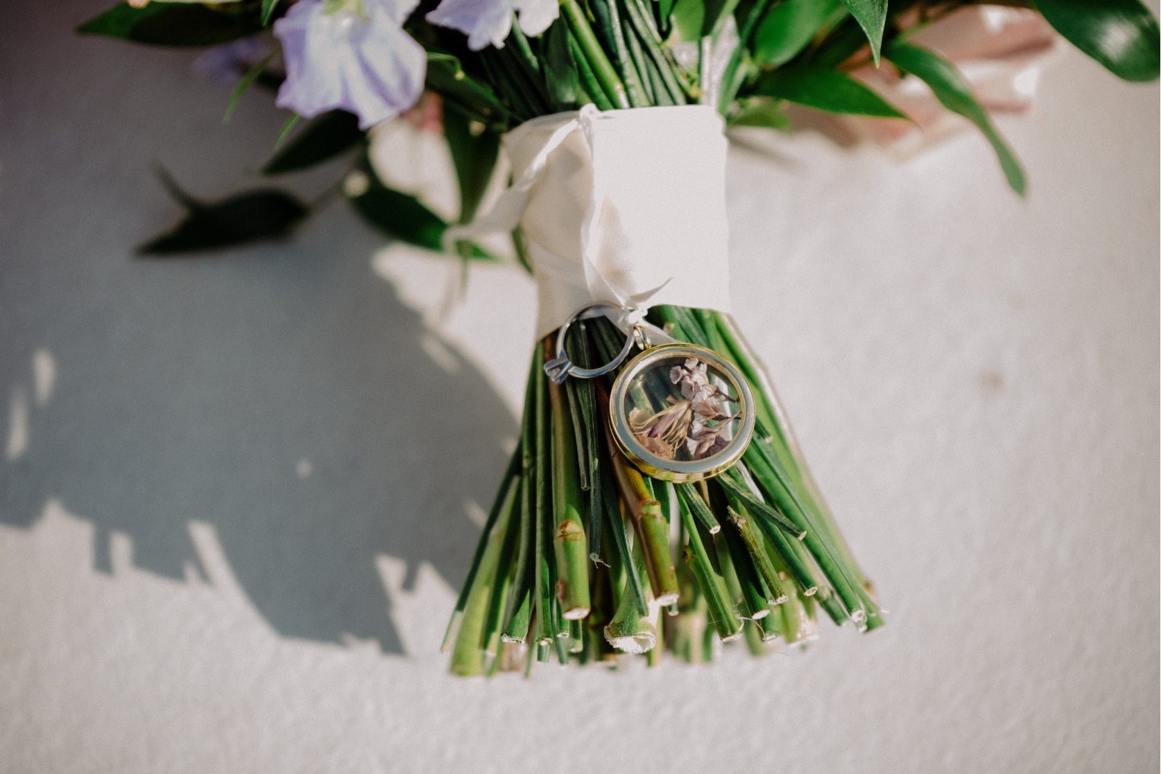 Close up of the step wrap of the bridal bouquet, which included a ring and keepsake tied on.