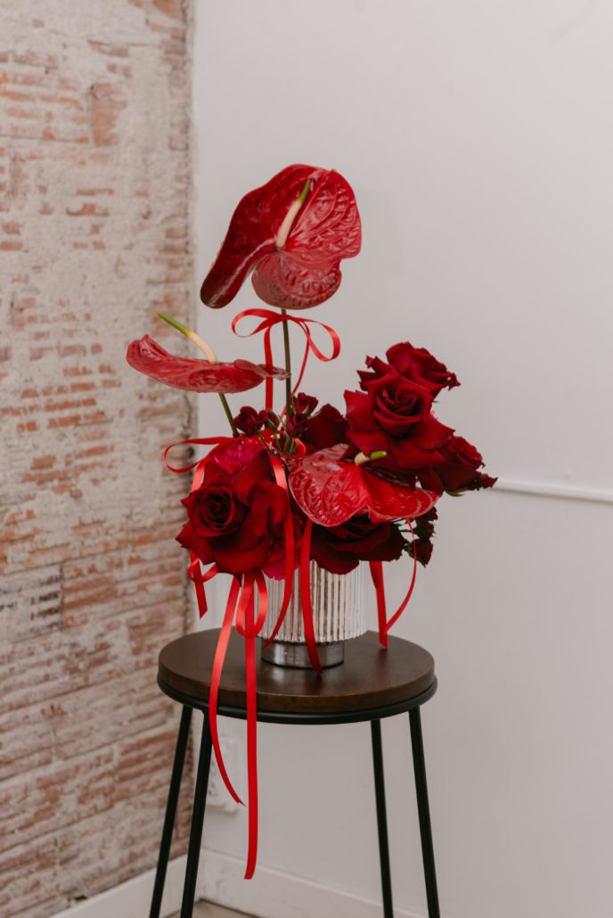 The Garnet from our Valentine's Day Collection is a front facing contemporary design all in red in a sleek silver electroplated ceramic vase.