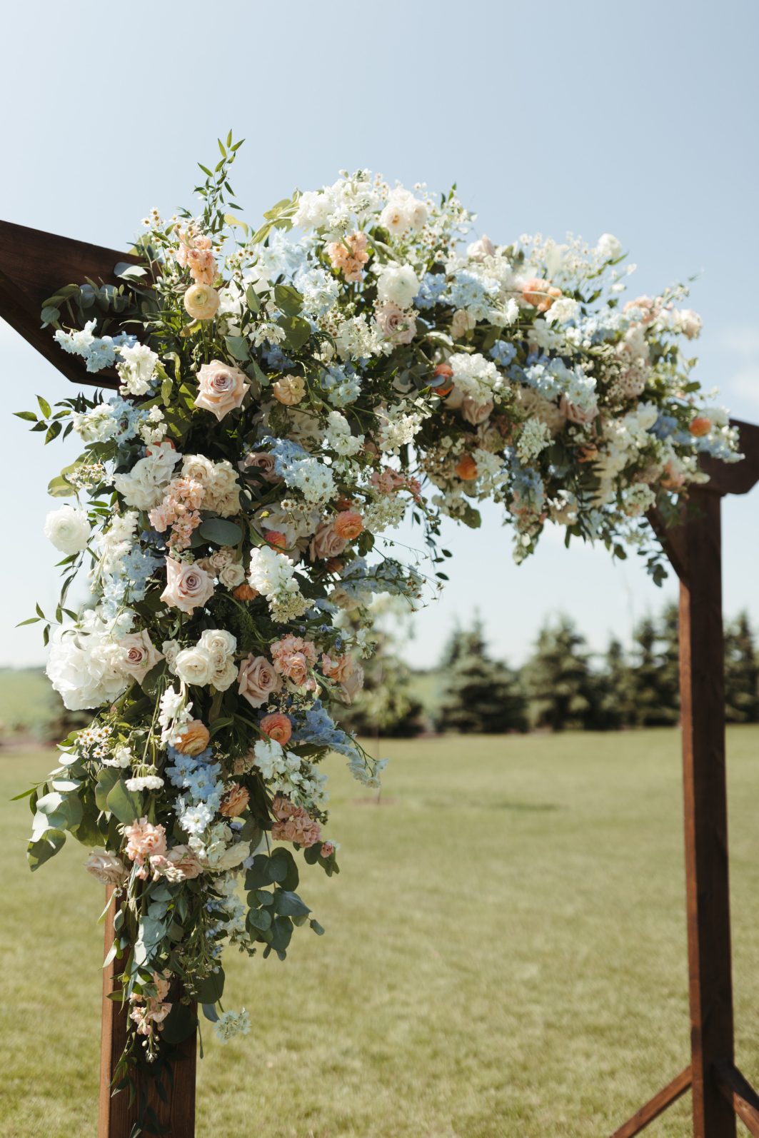 Arch with Pastel Floral Accents
