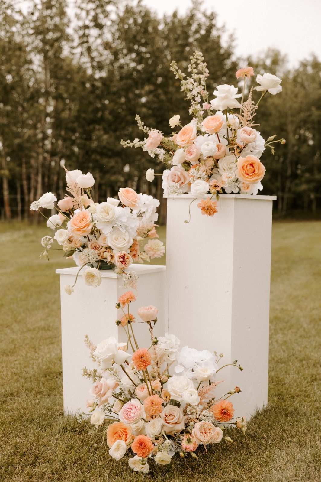 White and Peach Pillar Arrangements