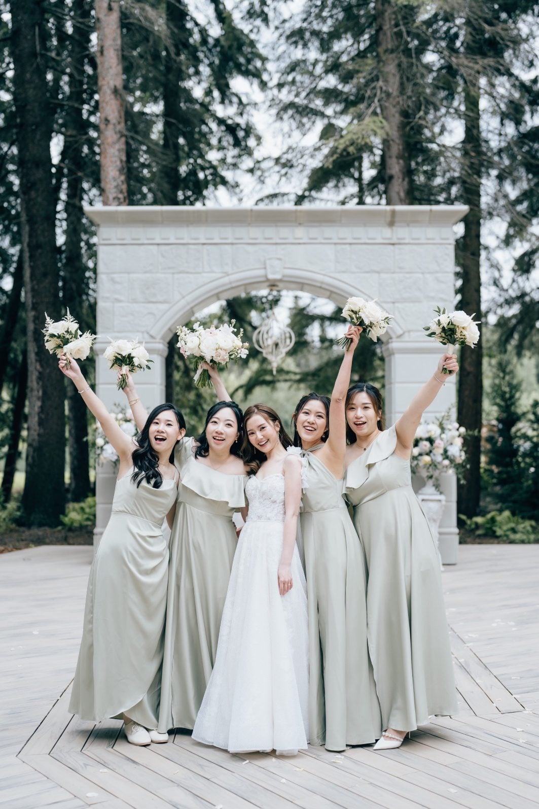 Bride and bridesmaids pose for this luxury wedding at Archway Manor