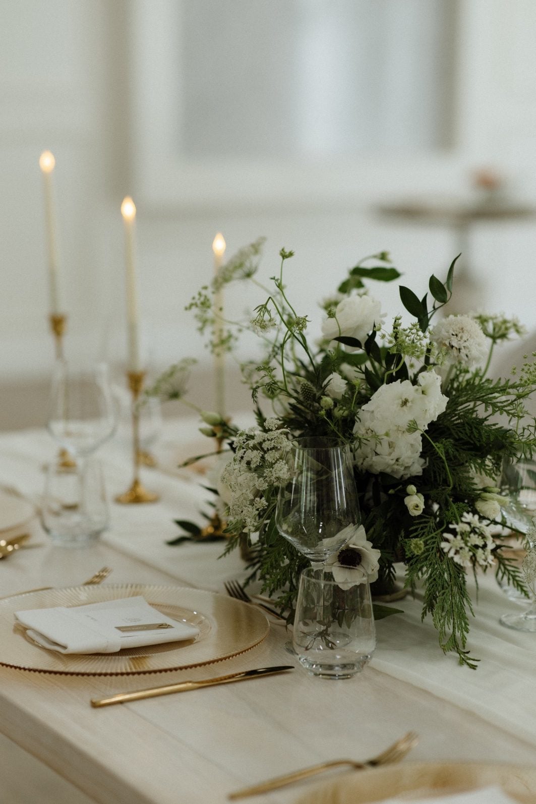 White + Green Gardeny Centrepieces White and green centrepieces for guest tables at Archway Manor.