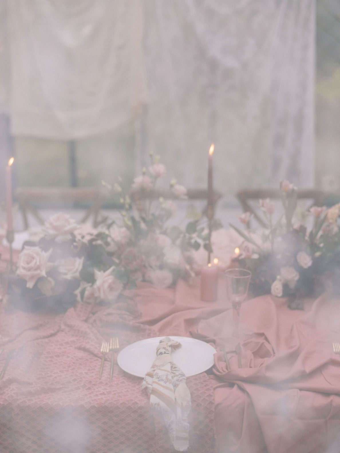 Justine Milton True to Hue Table through lace Image captures the marsala inspired table scape, but blurred as it was taken from behind one of the lace fabrics hanging from the ceiling at this True to Hue photoshoot.