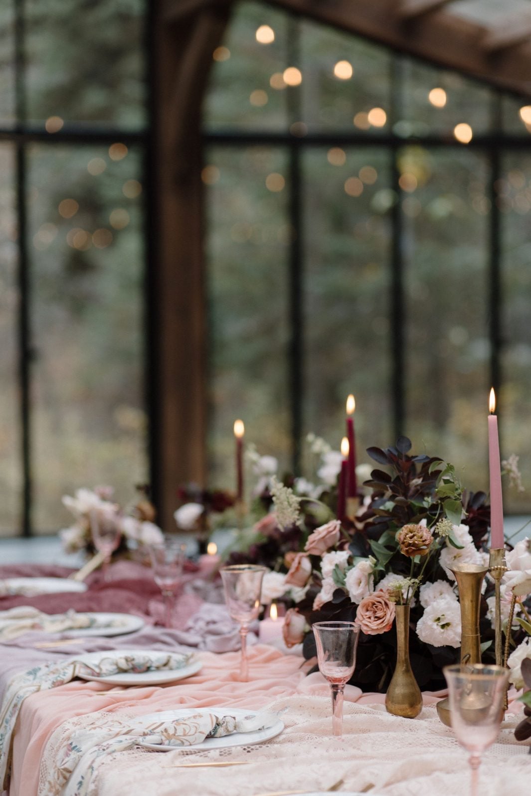 Nikki Collette True to Hue Marsala Tablescape Romantic glow of candlelight nestled amongst the centrepiece florals and soft pink table linens for this True to Hue photoshoot.